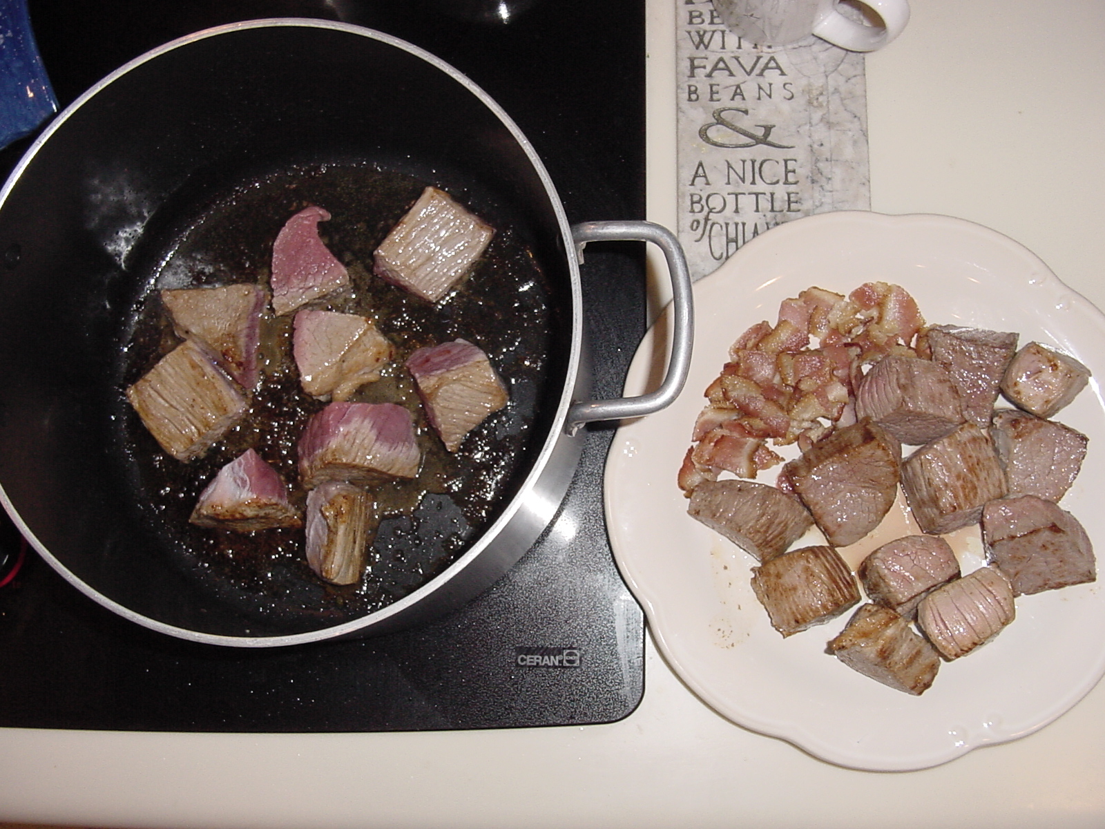 Sautéing the bacon and beef